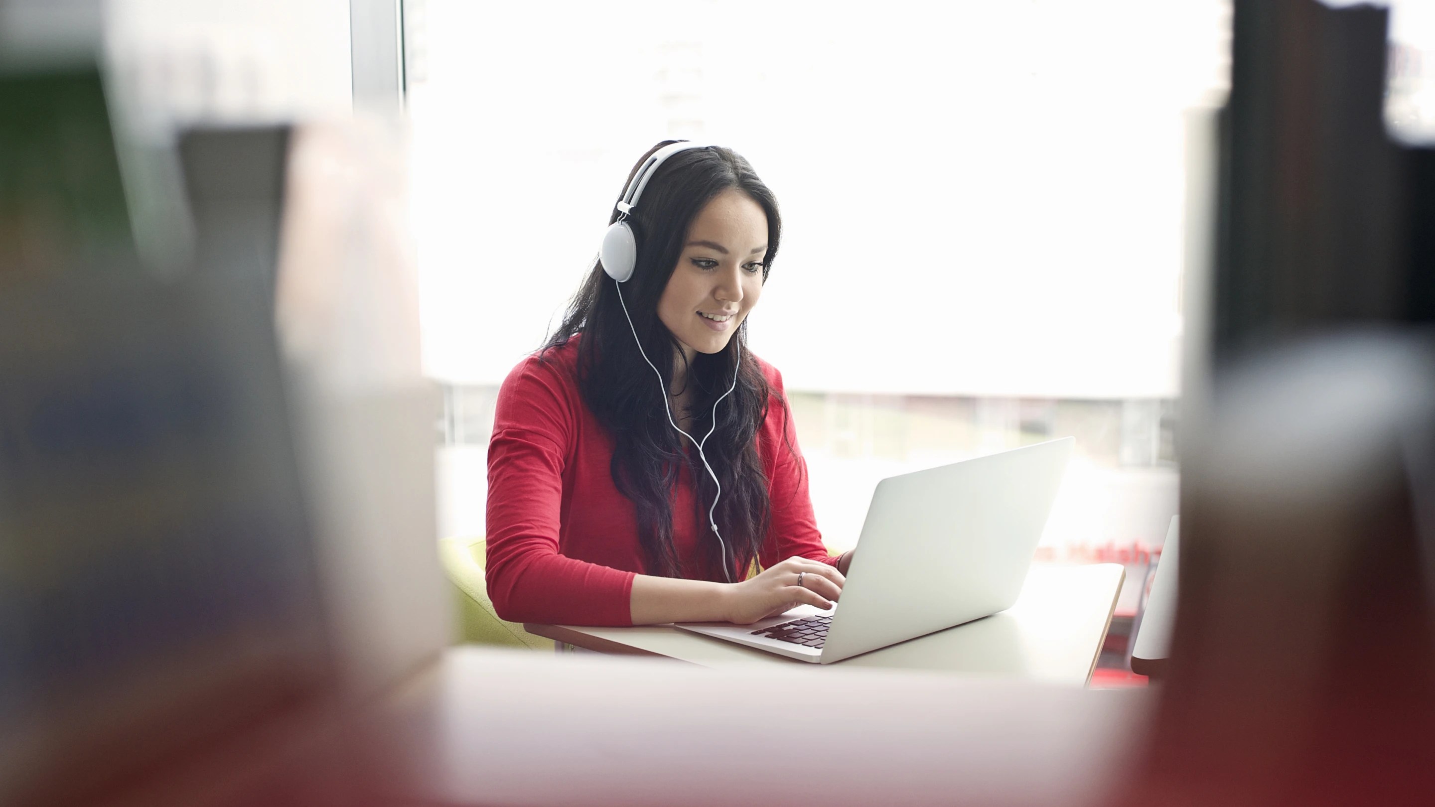 woman studying online on her laptop