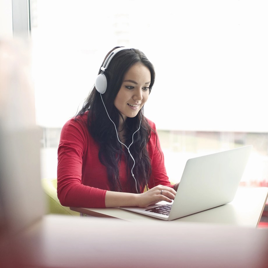 woman studying online on her laptop